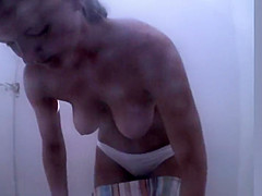 Mature woman preparing for the beach