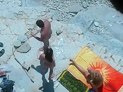 Horny blonde enjoys the beach