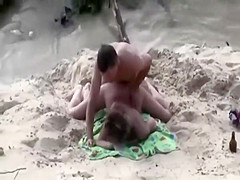 Wild plowing fully spied on a beach