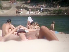 Nudist girl's boobs groped by a guy