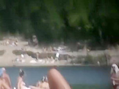 Nudist girl's boobs groped by a guy