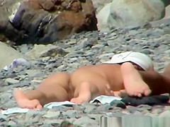 Small boobs nudist woman sunbathing her tight body