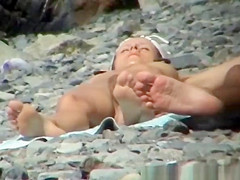 Small boobs nudist woman sunbathing her tight body