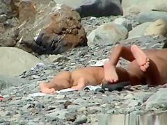 Small boobs nudist woman sunbathing her tight body