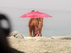 Chubby girl undresses at the beach