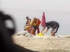 Chubby girl undresses at the beach