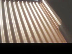 Young Russian girl in beach cabin