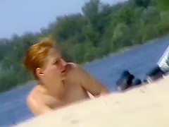 Nudist woman spied in the nudist beach