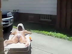 Well tanned neighbor's ass by the pool