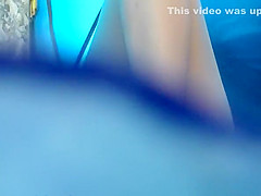 Nudist woman inside tent