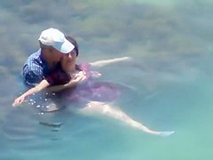 Dressed mature lady sucks her husband