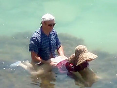 Dressed mature lady sucks her husband