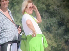 Blowjob in front of other nudists