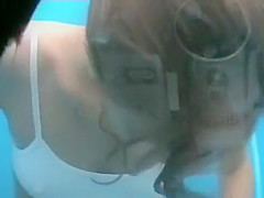 Close up of a shaved pussy and tan lines