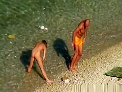 Nude woman swimming and drinking