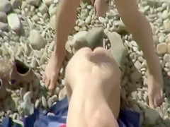 Bent her over and fucked on a beach