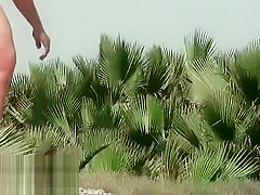 Tiny cutie caught on a nudist beach voyeur cam