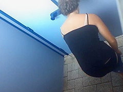 recording girls changing clothes on the beach