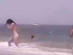 Girls Playing Games at the Nude Beach