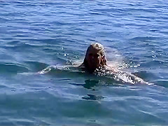 Young Milf posing shaved pussy at public place