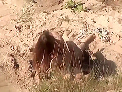 Voyeur on public beach. Hot young couple sex