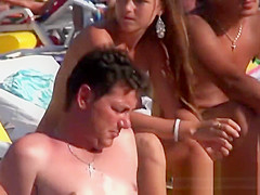 Young topless teens on the beach showing natural firm boobs in public!