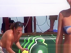 Young topless teens on the beach showing natural firm boobs in public!