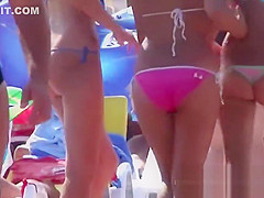 Young topless teens on the beach showing natural firm boobs in public!