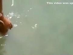 secret voyeur in the water at beach