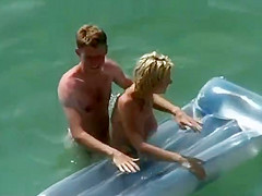 secret voyeur in the water at beach