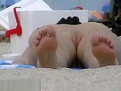 Blonde cutie undressing nudist beach voyeur video