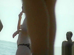 Hot nude girl was easily spied by the beach voyeur hunter