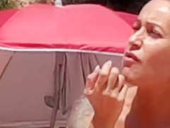 Voyeur - Big boob topless babe with friends on beach