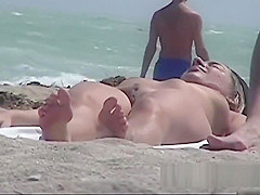 Stunning tanned brunette with a neat pussy in a beach porno