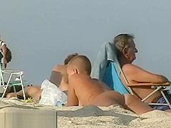 Spy nude cams on the beach get a lot of naked chicks