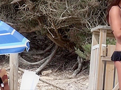 hidden cam of young nude woman on the beach