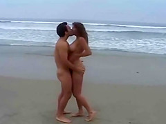 milf with huge boobs fucking in the beach