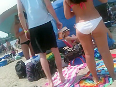 2 bikini friends at the beach candid