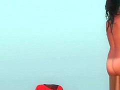Nudist beach voyeur vid with a hot brunette