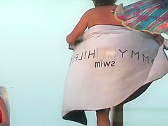 Nudist beach voyeur vid with a hot brunette