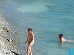 Couple fucked on a public beach while as people walked near