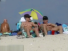 Couple split by Strangers on a nude beach