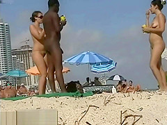 Couple split by Strangers on a nude beach