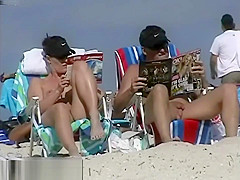 Couple split by Strangers on a nude beach