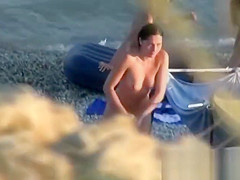 Naked and showing everything at the nude beach