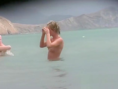 Naked and showing everything at the nude beach