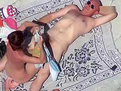 Mature suck cock at the nude beach