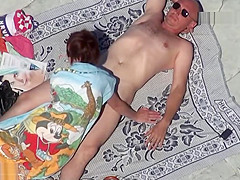 Mature suck cock at the nude beach