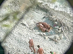 Voyeur Films A Couple Having Sex On The Beach