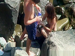 Voyeur on nude beach films publiic sex